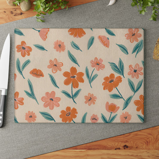 Tempered Glass Cutting Board adorned with a floral pattern throughout. Also, serves as a serving or decorative tray for the home and garden. 